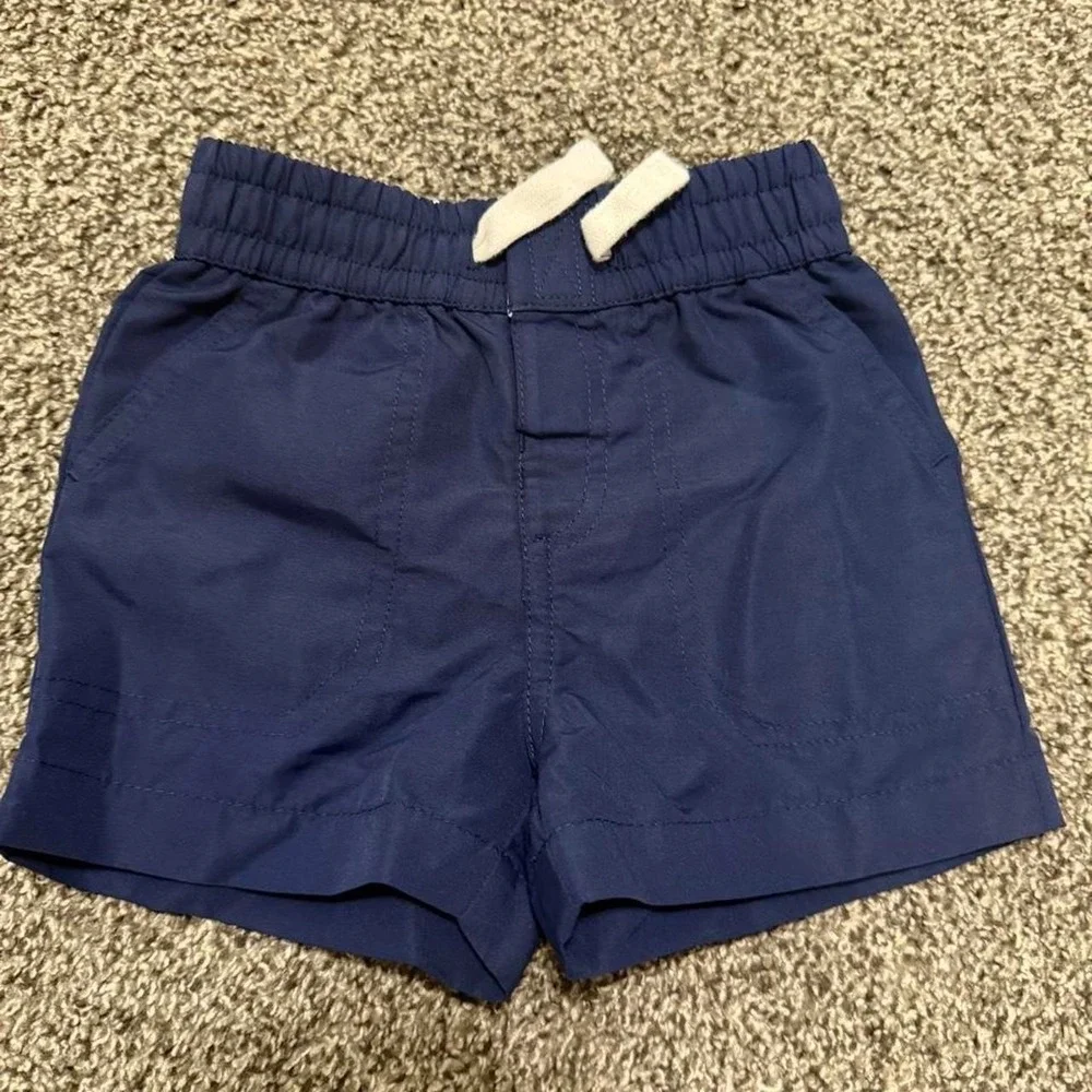 Navy blue Vineyard Vines swim trunks for 18 months